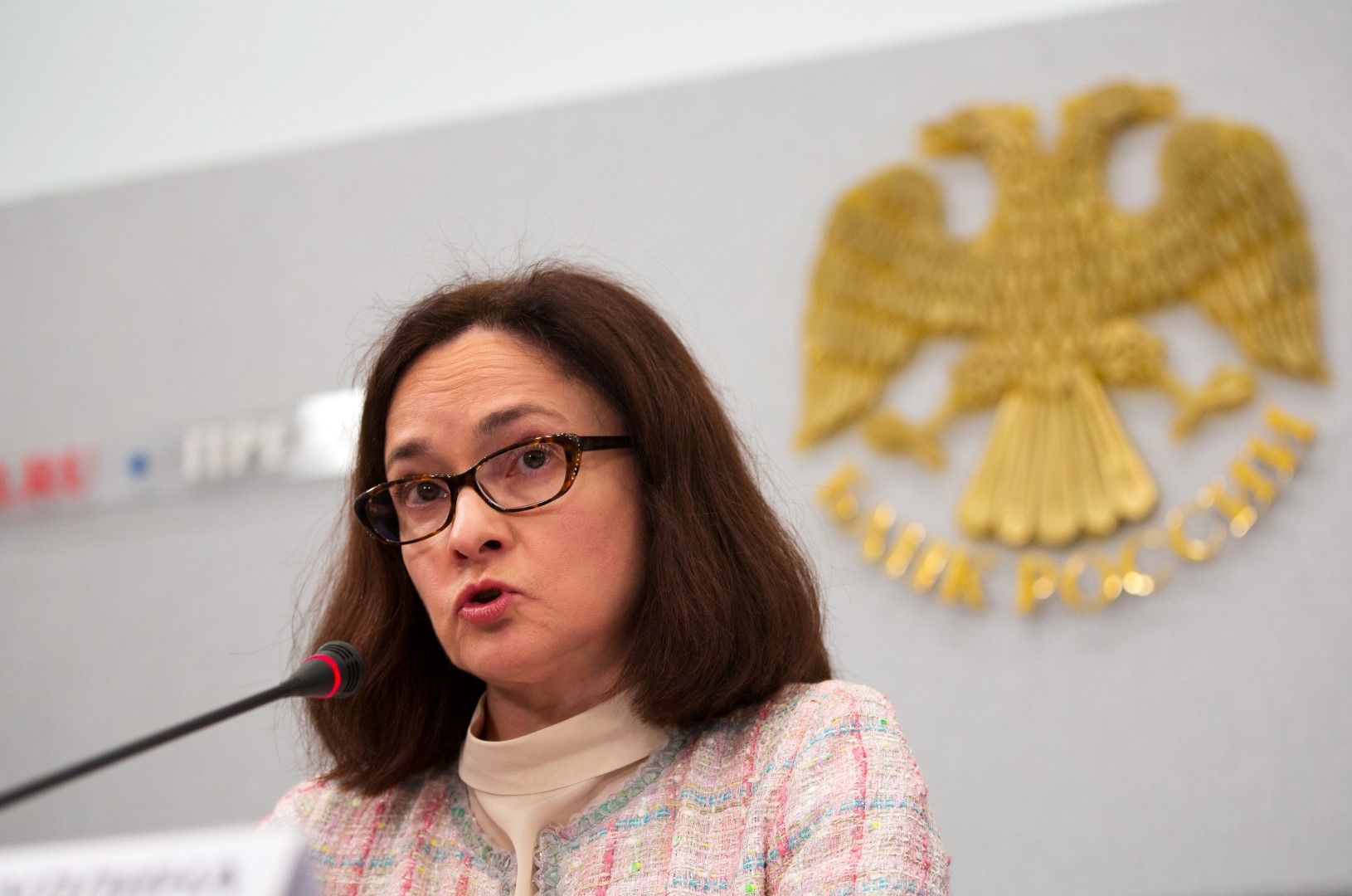 Elvira Nabiullina, governor of Russia's central bank, speaks during a rate decision news conference in Moscow, Russia, on Friday, March 13, 2015. Russia's central bank lowered its main interest rate in line with most economist forecasts, as stabilizing inflation clears the path to boosting an economy buckling under low oil prices and sanctions over Ukraine. Photographer: Andrey Rudakov/Bloomberg *** Local Caption *** Elvira Nabiullina