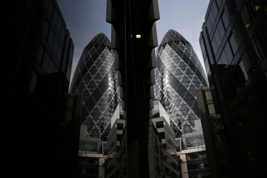 The 30 St Mary Axe skyscraper, which is known locally as "The Gherkin" is seen in London April 24, 2014. London's landmark Gherkin office tower has been placed into receivership by its creditors, accountancy firm and joint receivers Deloitte said on Thursday, paving the way for a possible sale of the skyscraper. REUTERS/Stefan Wermuth (BRITAIN - Tags: BUSINESS REAL ESTATE) - RTR3MHUJ