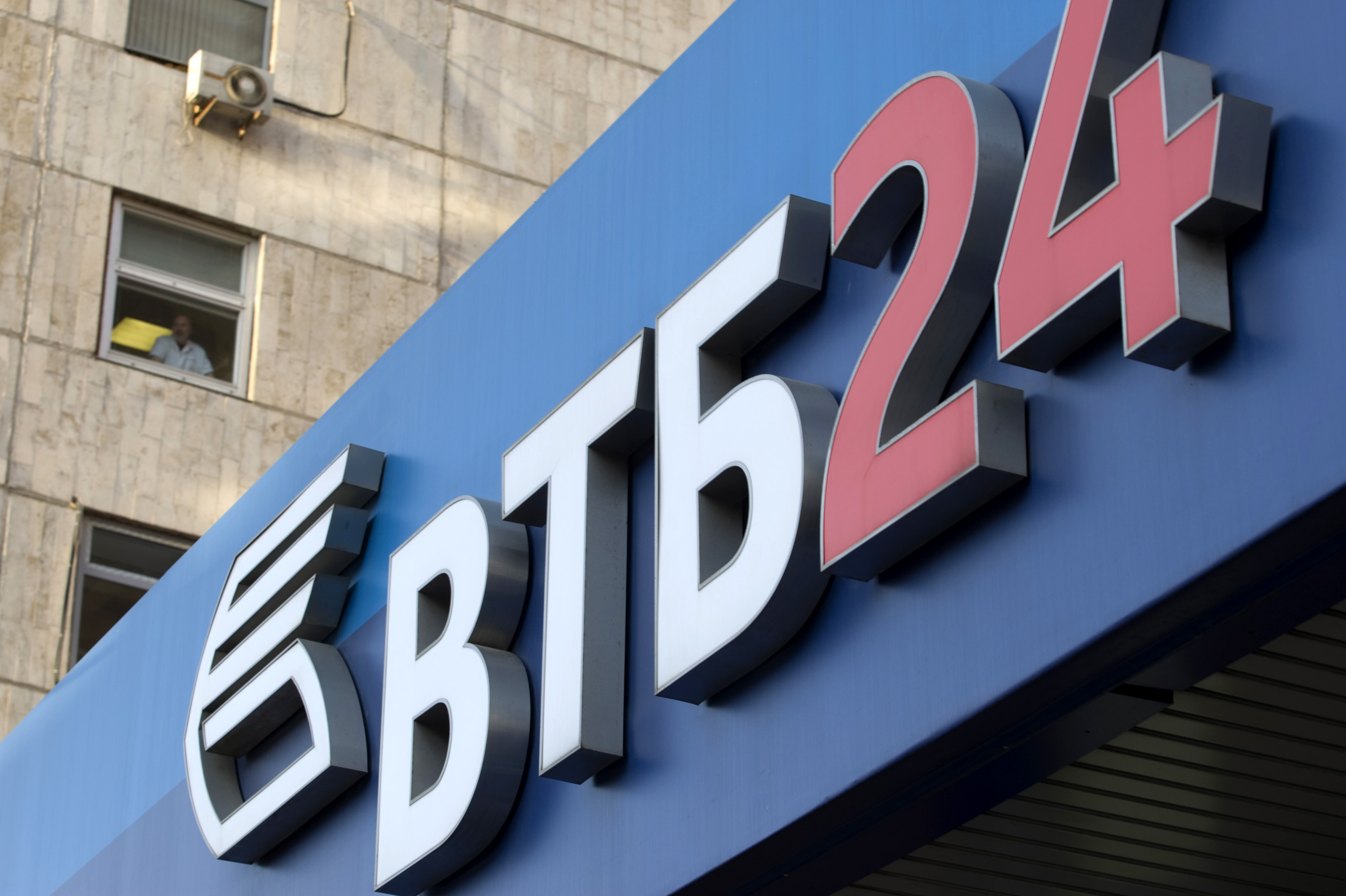 The company logo for the VTB Bank is displayed on a branch in Moscow, Russia, on Wednesday, Sept. 24, 2008. Forming part of the VTB Group the bank is also known as the Vneshtorgbank. Photographer: Alexander Zemlianichenko Jr/Bloomberg News