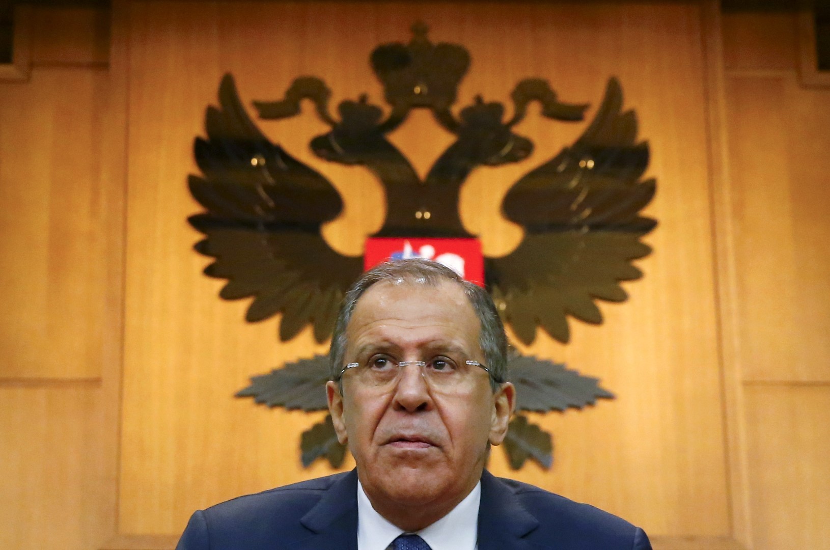 Russian Foreign Minister Sergei Lavrov leaves after giving a news conference in Moscow, Russia, January 26, 2016. Ukraine is dragging its feet on implementation of the Minsk peace agreement because it wants to keep in place the Western sanctions imposed on Russia, Lavrov said on Tuesday. REUTERS/Maxim Shemetov TPX IMAGES OF THE DAY - GF20000107513