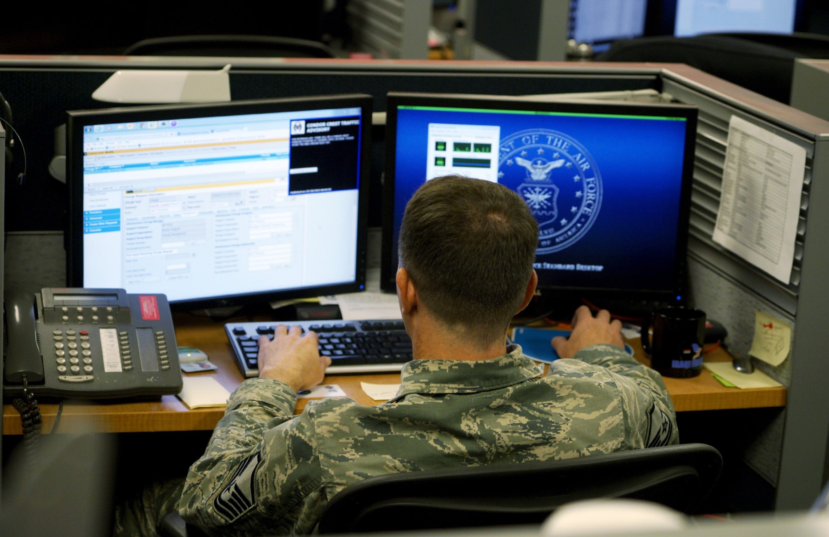 A U.S. Air Force airman works at the 561st Network Operations Squadron (NOS) at Petersen Air Force Base in Colorado Springs, Colorado July 20, 2015.  The 561st NOS executes defensive cyber operations in response to U.S. Cyber Command orders and intelligence based threats.    REUTERS/Rick Wilking - GF10000165291